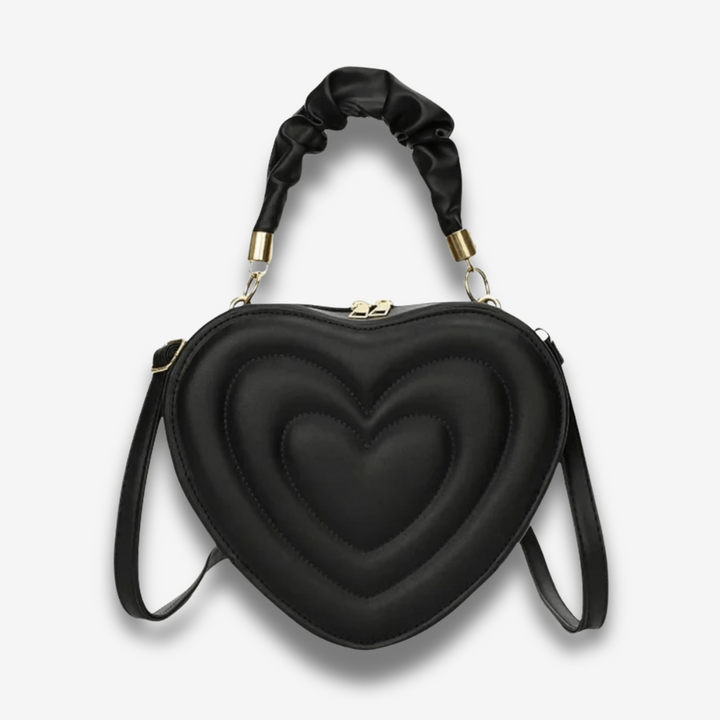 Warri | verspielte Herz‑Form‑Ledertasche