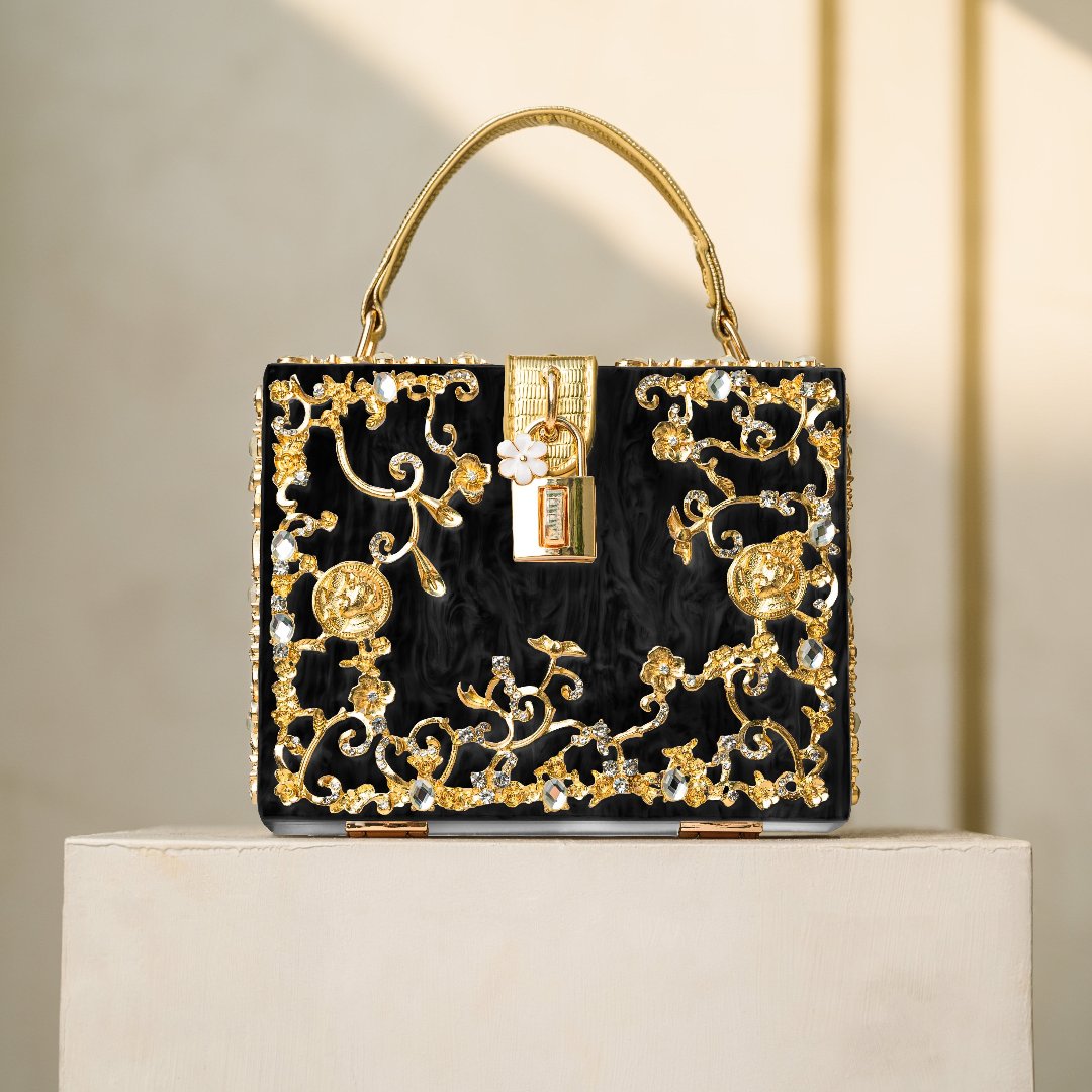 Zarqa  | Acryl Clutch mit Gold‑Blüten
