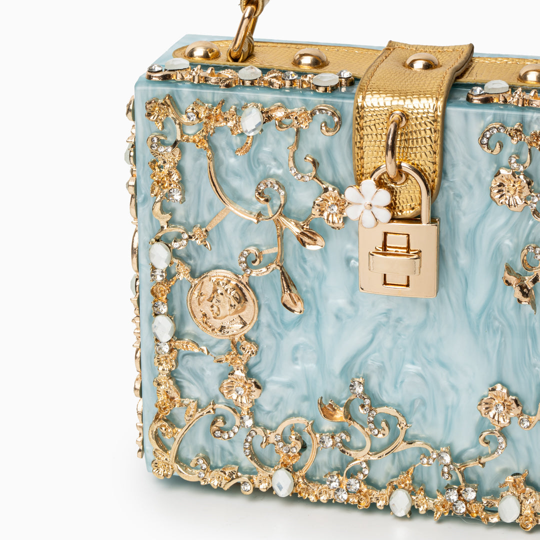 Zarqa  | Acryl Clutch mit Gold‑Blüten