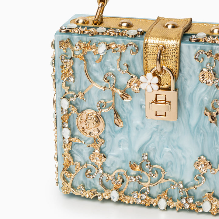 Zarqa  | Acryl Clutch mit Gold‑Blüten