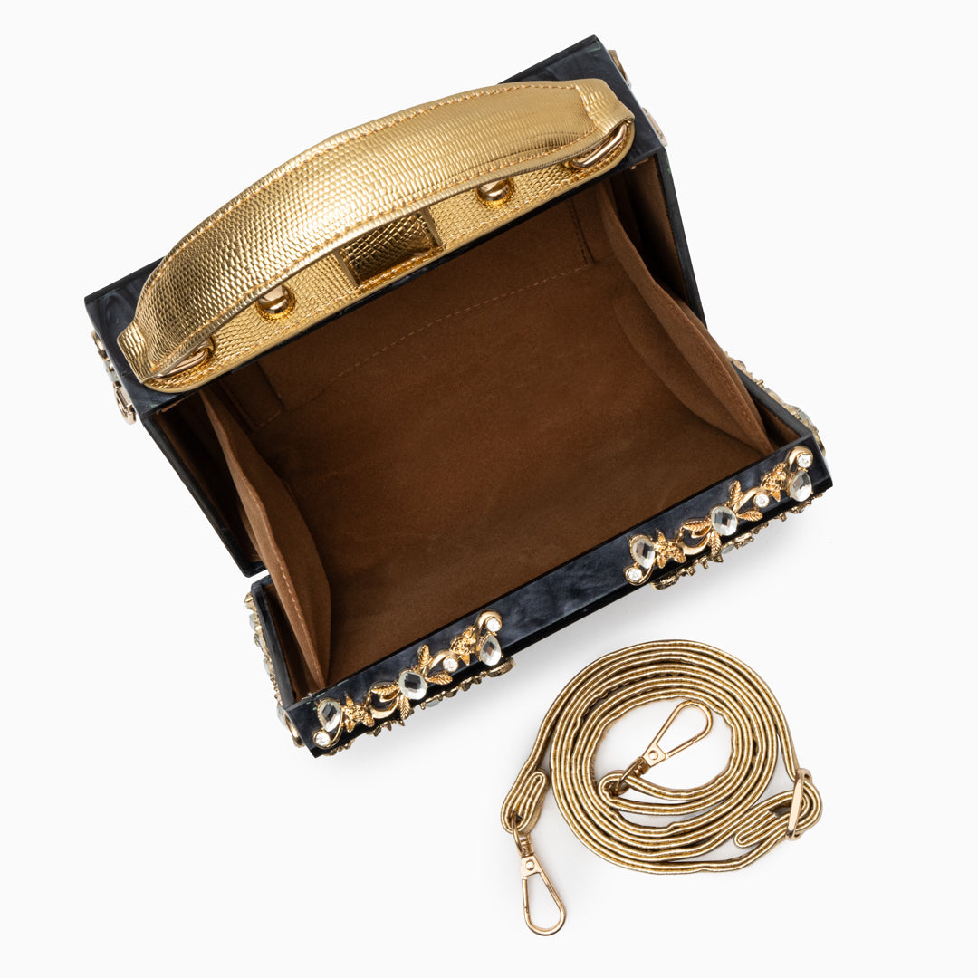 Zarqa  | Acryl Clutch mit Gold‑Blüten