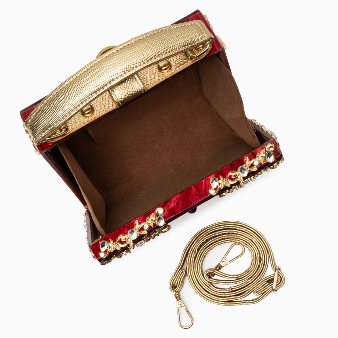 Zarqa  | Acryl Clutch mit Gold‑Blüten