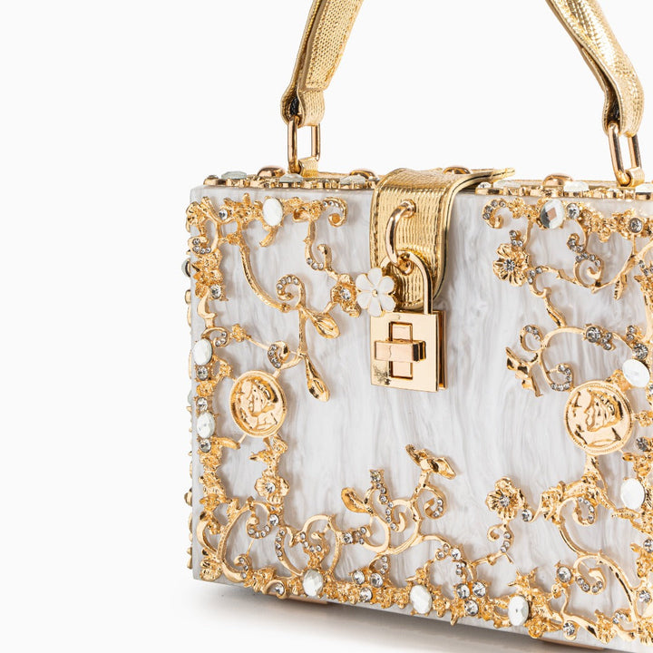 Zarqa  | Acryl Clutch mit Gold‑Blüten