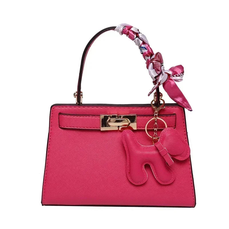 Kisangan | Strukturiertes Mini-Handbag mit Charme
