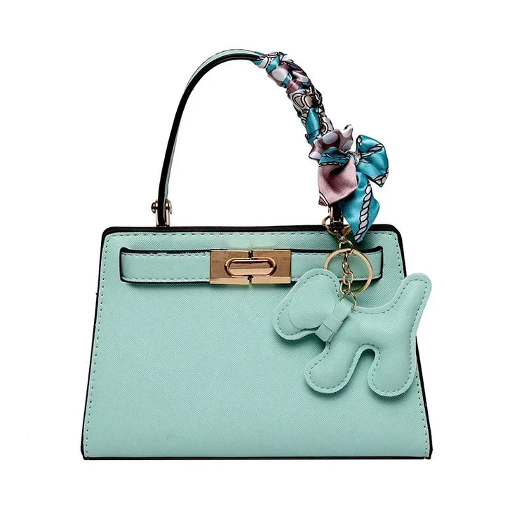 Kisangan | Strukturiertes Mini-Handbag mit Charme