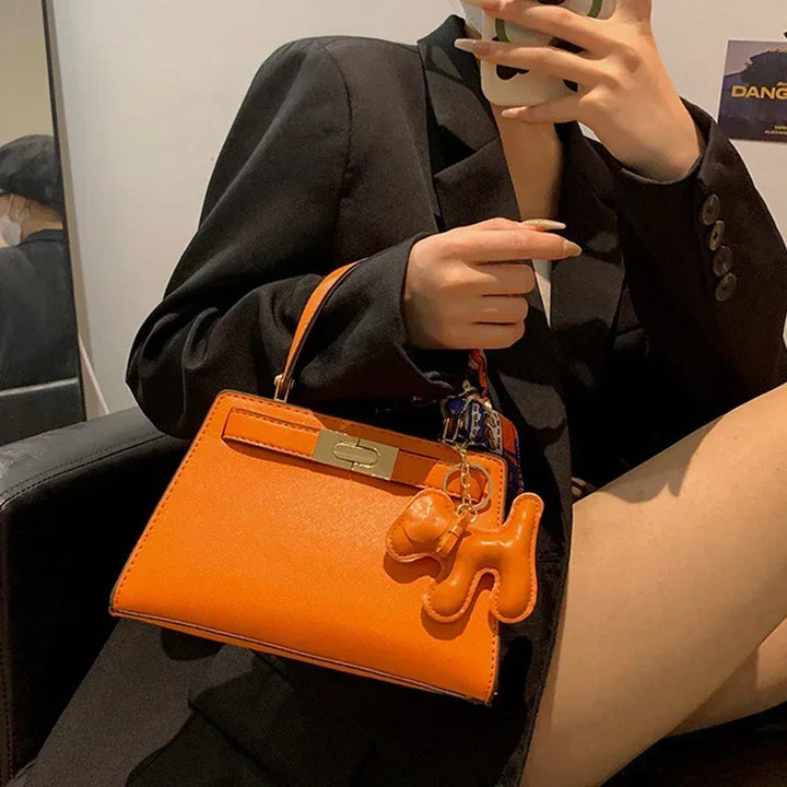 Kisangan | Strukturiertes Mini-Handbag mit Charme