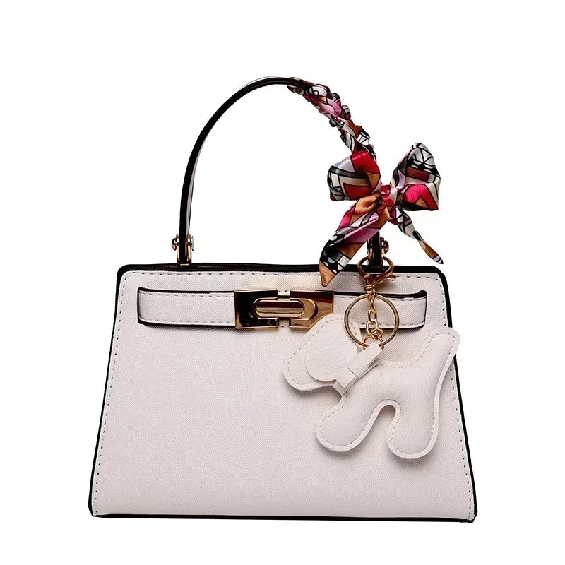 Kisangan | Strukturiertes Mini-Handbag mit Charme