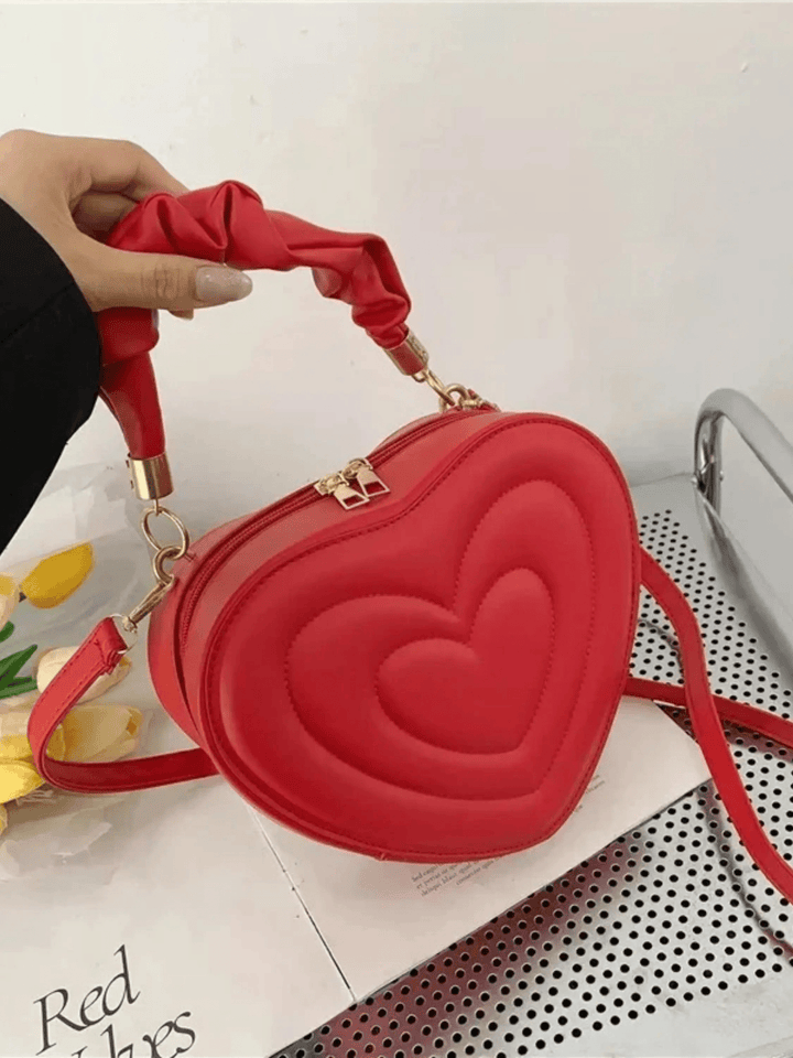 Warri | verspielte Herz‑Form‑Ledertasche