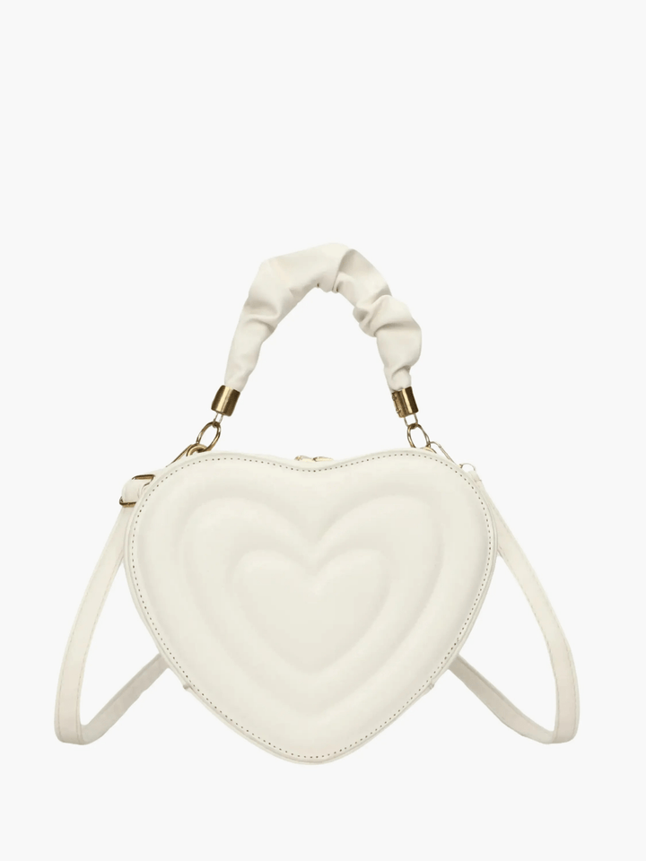 Warri | verspielte Herz‑Form‑Ledertasche