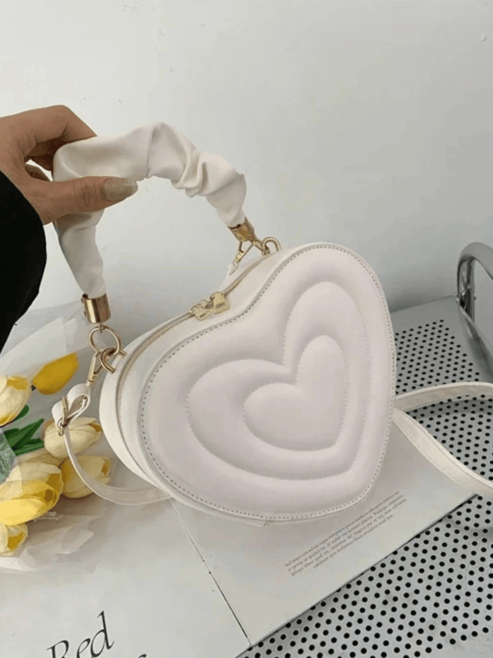 Warri | verspielte Herz‑Form‑Ledertasche