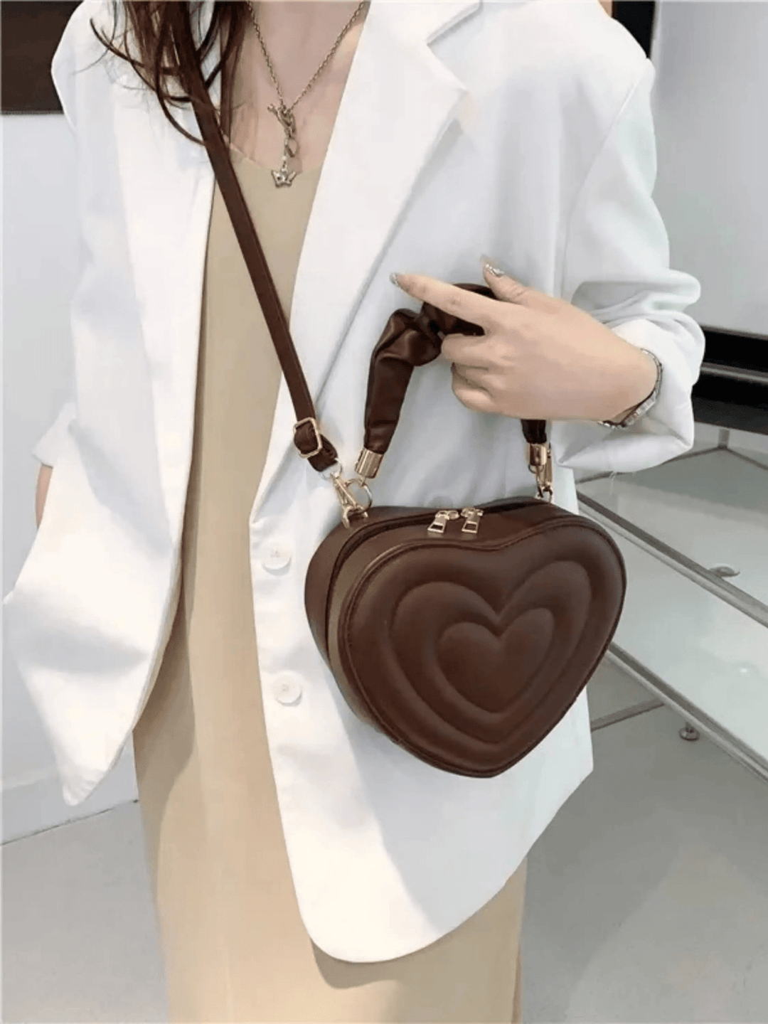 Warri | verspielte Herz‑Form‑Ledertasche