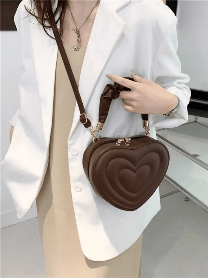 Warri | verspielte Herz‑Form‑Ledertasche