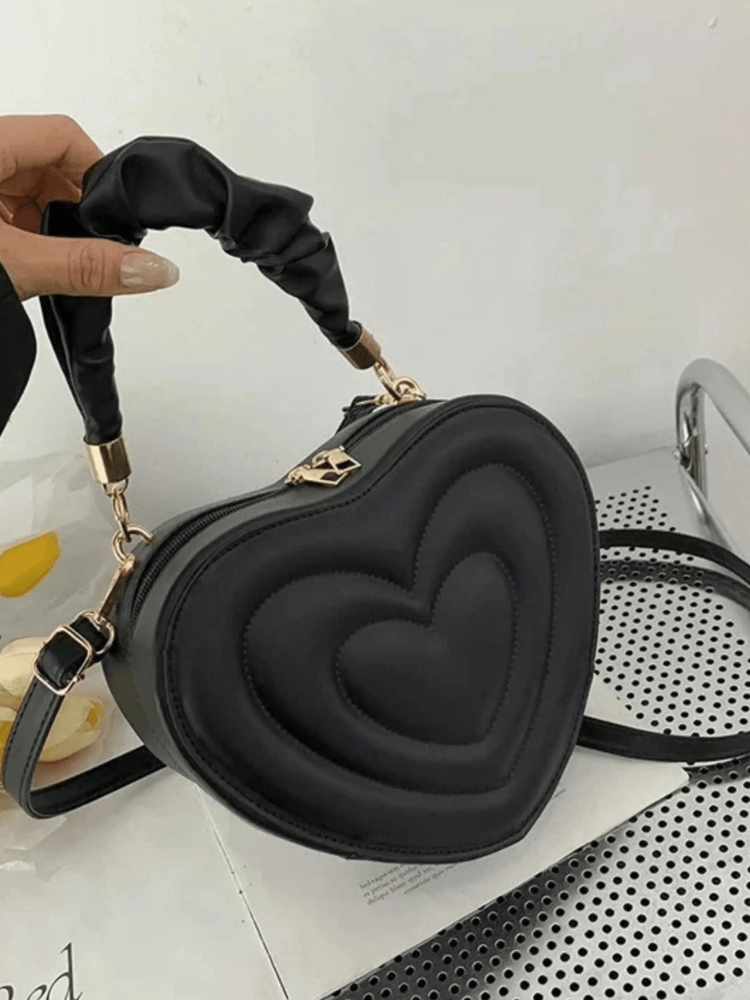 Warri | verspielte Herz‑Form‑Ledertasche