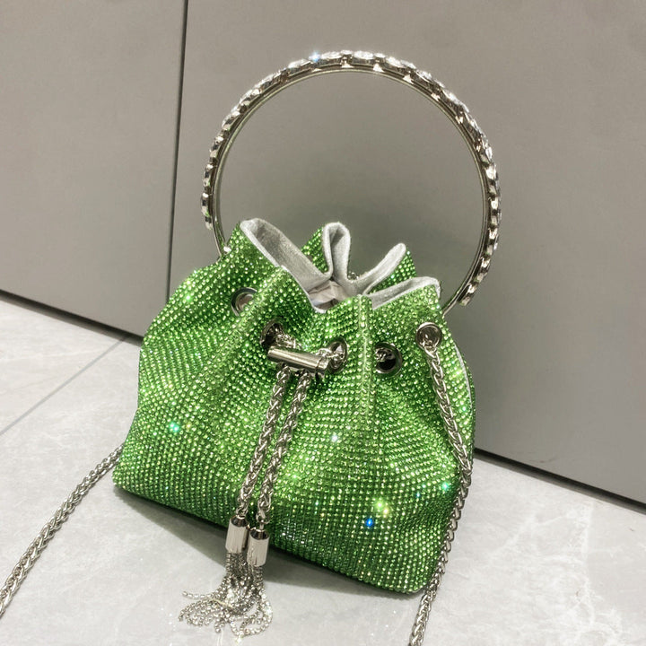 Yuma | Elegante zylindrische Metallic-Handtasche