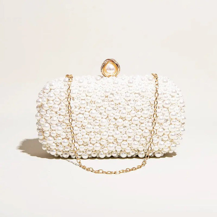 Whitehorse  | Perlen‑Clutch mit Gold‑Rahmen