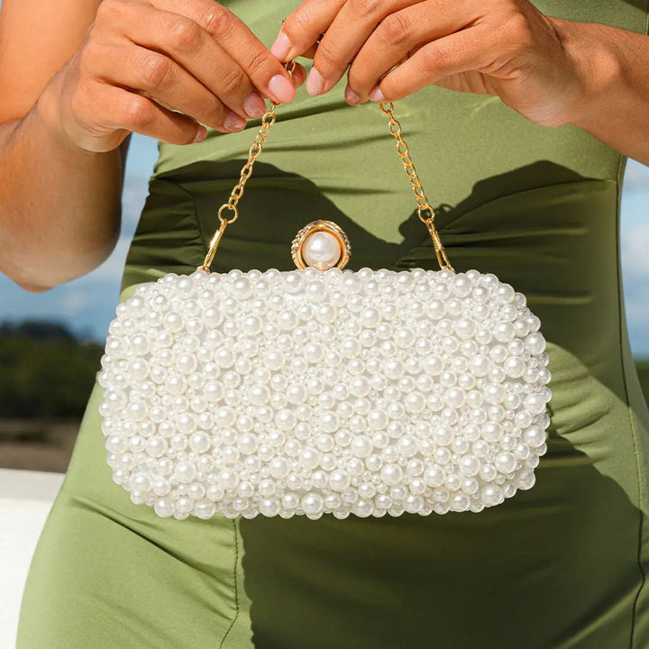 Whitehorse  | Perlen‑Clutch mit Gold‑Rahmen