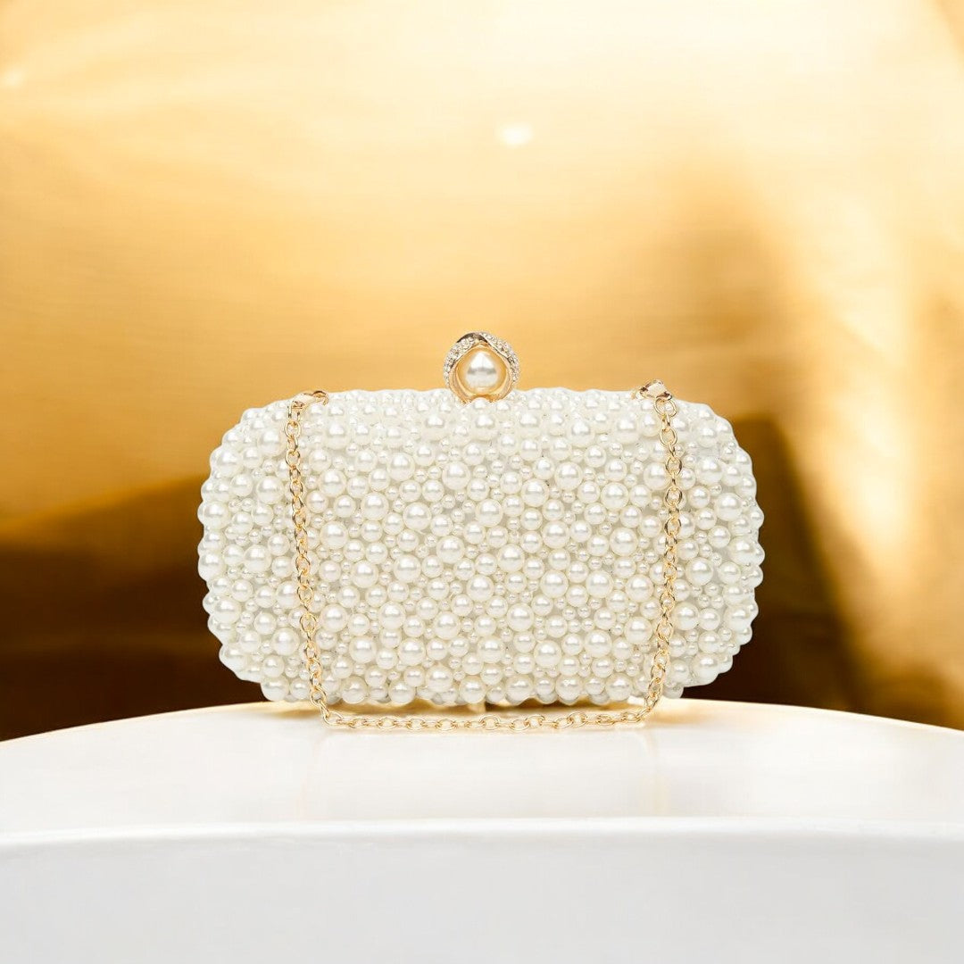 Whitehorse  | Perlen‑Clutch mit Gold‑Rahmen